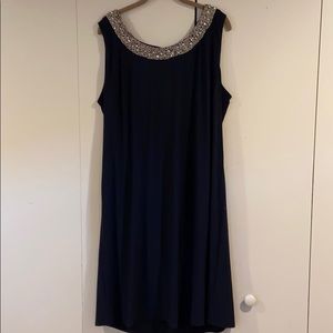 Cocktail dress with sheer overcoat.